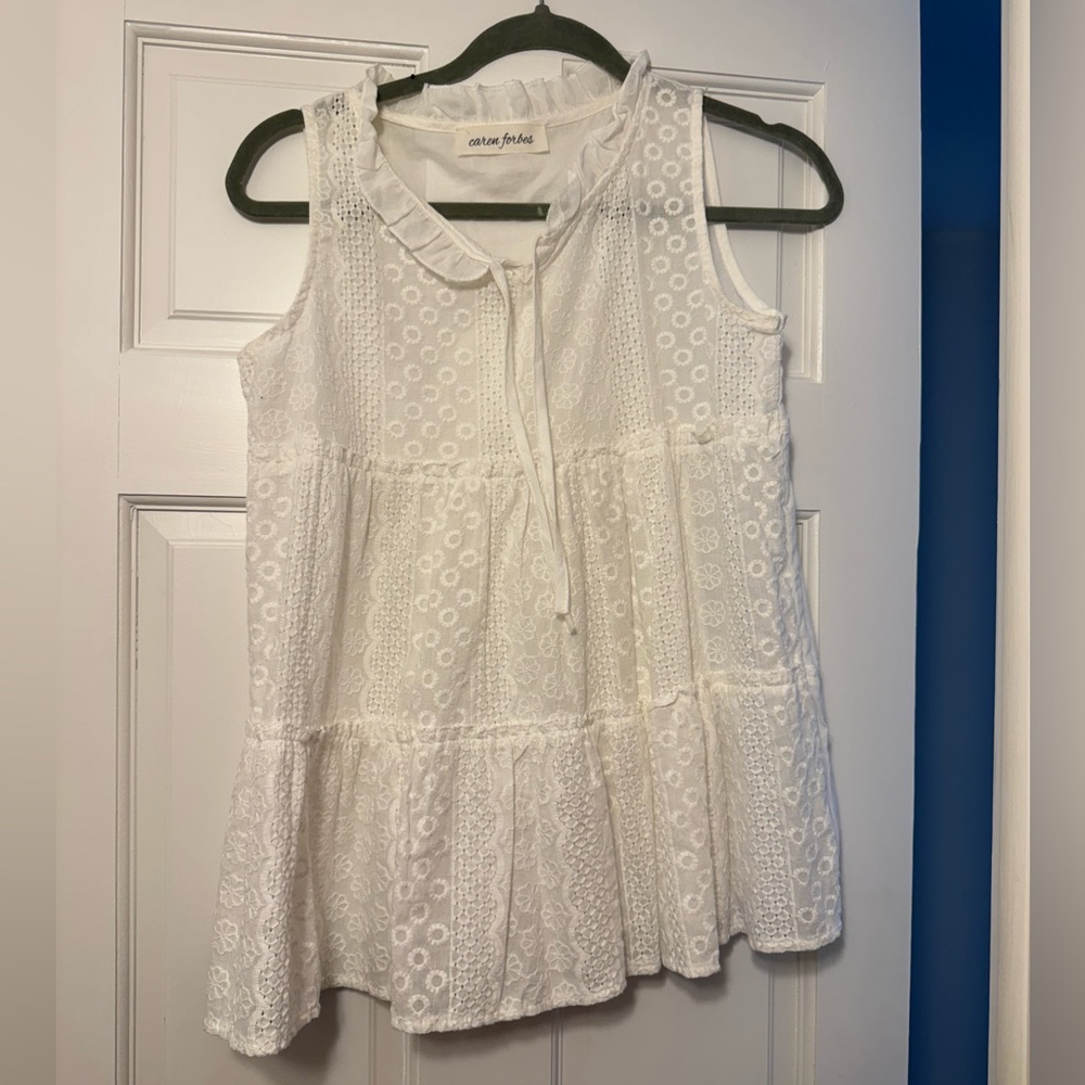 Caren Forbes white blouse